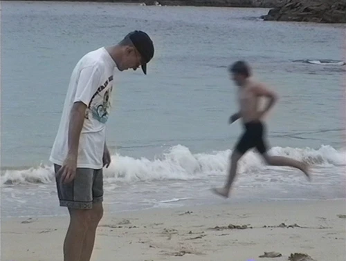 Julian and Luke enjoying beautiful Achmelvich Beach, a short walk from the hostel.