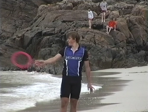 Gavin launches the Aerobie on Achmelvich Beach—minutes before a jellyfish gets him.