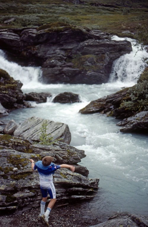 Shane skims stones at Fossegaldsbrui, a small glacial waterfall we’re following uphill.