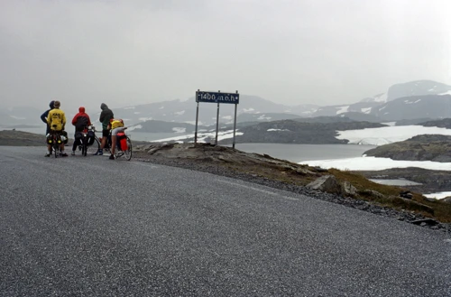 The group by the 1400m sign at Silja lake—higher than Ben Nevis! 16.5 miles.