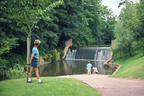 Philip Humphreys by the weir on the River Sid in The Byes Riverside Park, Sidmouth.