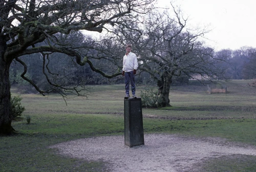 Warren, cool as you like, standing atop the Rufus Stone near Upper Canterton.