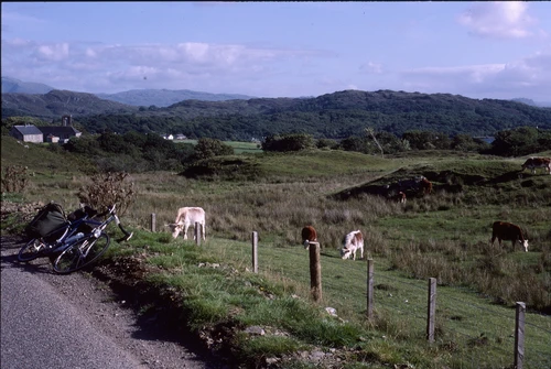 Michael's Mercian as he pauses to photograph back towards Arisaig; the primary school and St Mary's RC church left, Loch nan Ceall beyond.
