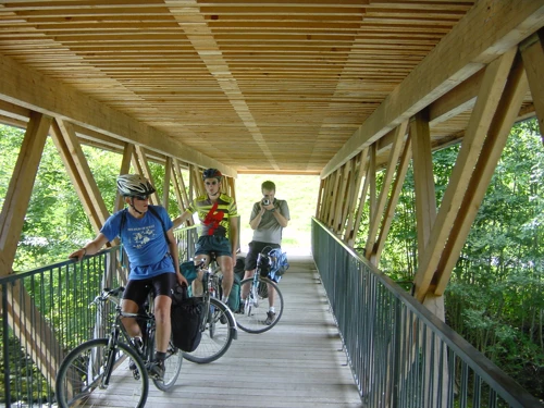 Olly snaps Michael filming on the Garstatt bridge, Route 9. 21.1 miles in.