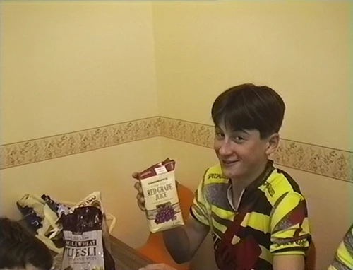 Tao flaunts his very expensive red grape juice.