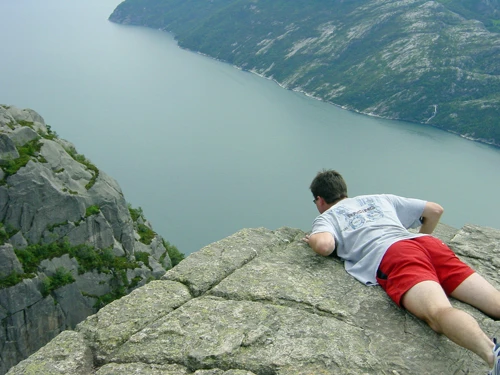 Why does Tao do these things? Peering over Pulpit Rock's precipice.
