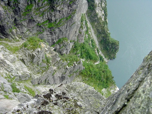 Olly's shot over Pulpit Rock's edge to the fjord far below.