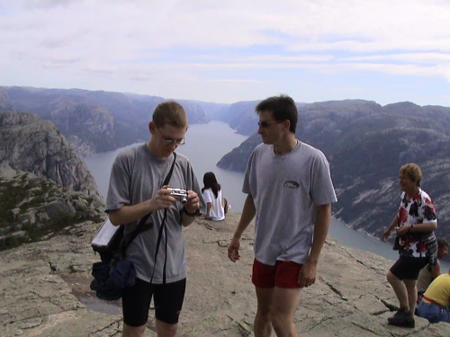 Olly readies his next death-defying shot on Preikestolen.