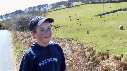 Josh takes a shine to the sheep.