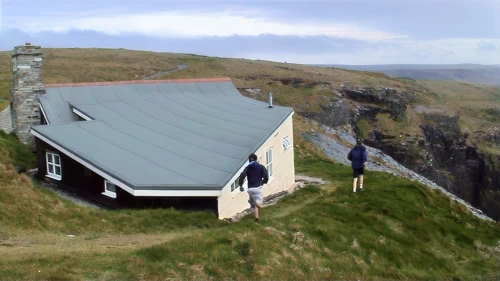 Tintagel Youth Hostel, with our coveted front dorm half-buried in the hillside.