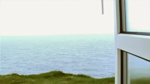 Wind-battered morning views from our dorm at Tintagel Youth Hostel.