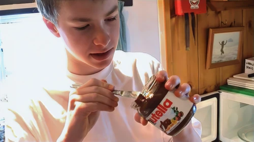 Joe tests his Nutella after a second blast in the microwave—solidified overnight.