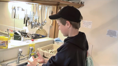 Josh does more than his fair share: washing up after breakfast, despite sworn camera denial.