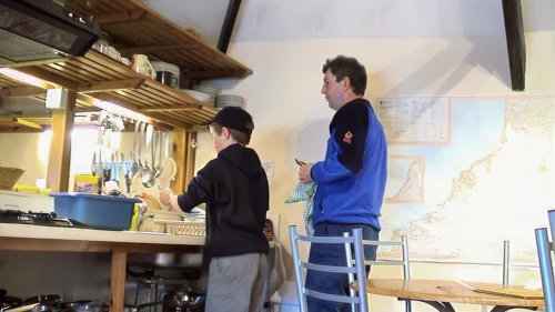 Josh and Michael in Tintagel Youth Hostel kitchen.