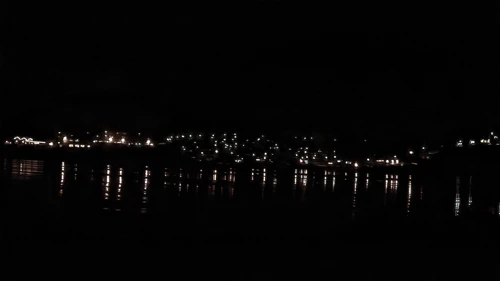 The tide ebbs as we look back to Perranporth from the beach.