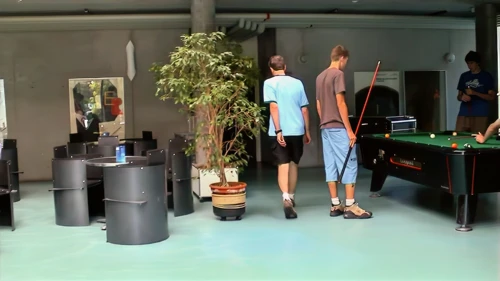 Michael heads through the spacious reception to our dorm.