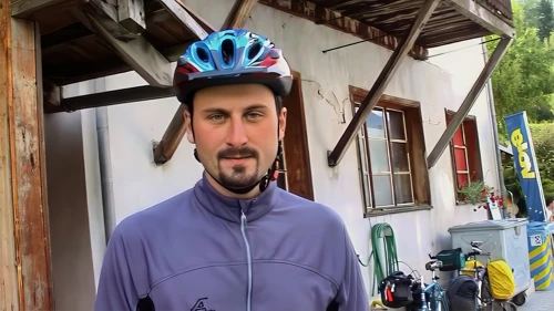 Tao leaving the Volg supermarket, Zillis.