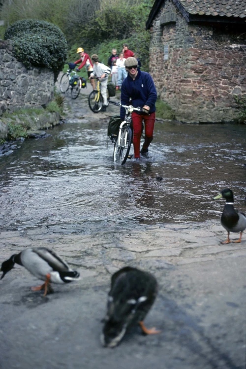 Mark Sloman comes a cropper attempting the Allerford ford.