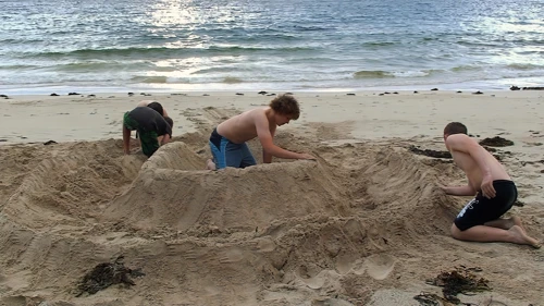 Intrepid sand-fortress builders at work on Achmelvich’s secluded beach.