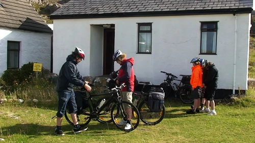 About to leave Achmelvich Youth Hostel, our annexe dorm behind us