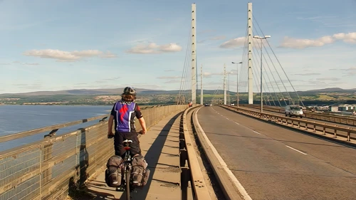 Ash crossing the Kessock Bridge into Inverness, 48.1 miles into the ride.