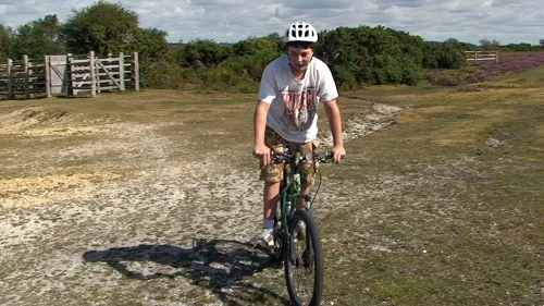 Lawrence on the track near Picket Post car park, passing under the busy A31, 3.2 miles in.