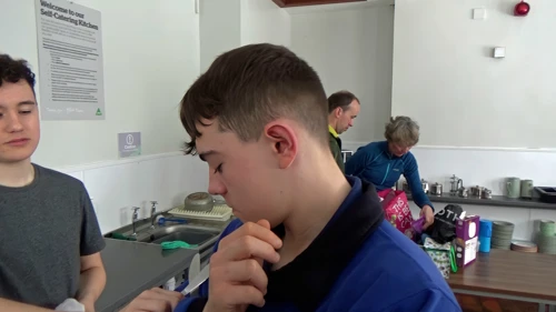 Two hostellers zombie-walking into the snow when the fire alarm sounded.