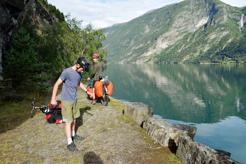 George and Will on Lustrafjorden’s shore, on the abandoned cycle route near the Otta tunnel