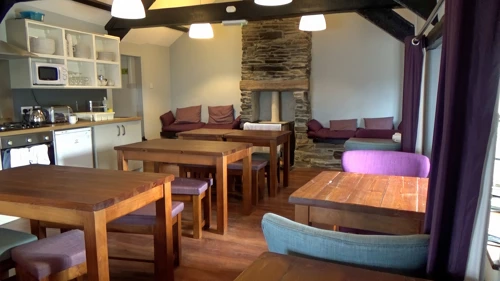 Tintagel Youth Hostel’s small but cosy kitchen and common room.