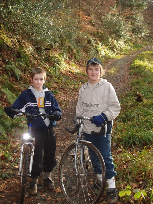 Dennis and Josh winding along the Two Moors Way in Holne Woods.