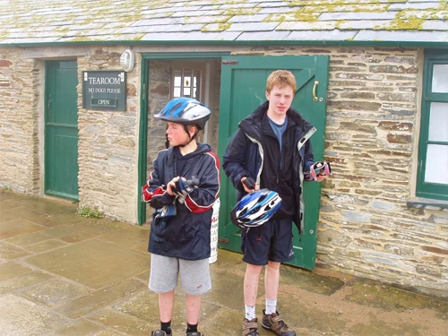 Josh and Joe in the mist leaving the café at Bedruthan Steps.