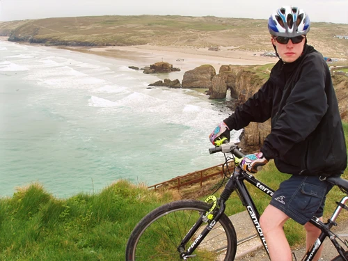 Joe Venables by the hostel, overlooking Perranporth Beach.