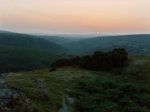 Sunset beyond Two Bridges as the Dart Valley slips into darkness.