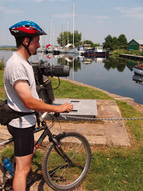 Tao at Turf Lock with the Exeter Ship Canal behind