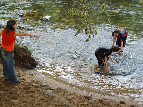 Dennis and Joe have a water fight in the River Dart