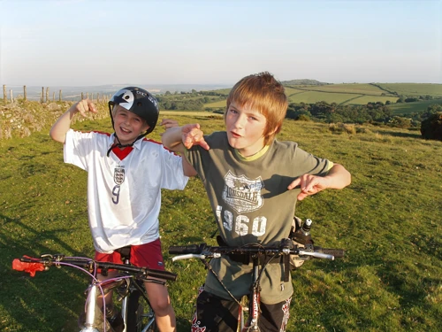 Glen and Dennis reach the open moor at Skerraton Down.