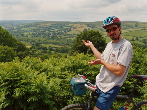 Tao frames a view of Widecombe from the Bonehill–Natsworthy track.