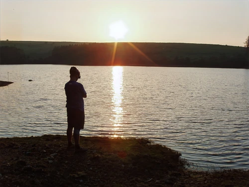 Gavin at Venford Reservoir, pausing to savour the peace.