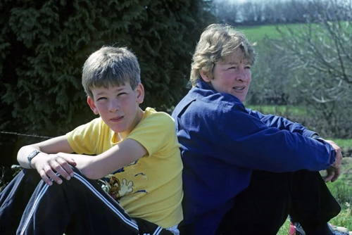 Andrew and Jennifer Thompson, back-to-back on the Challacombe wall.