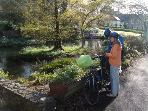 Heidi and Charles by the village pond opposite Veryan Village Hall.