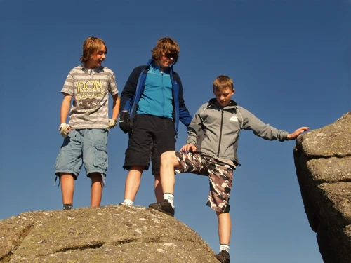 Jack, Ash and Callum scrambling on Bonehill Rocks.