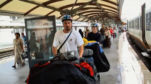 Putting trolleys to work at Paris Gare du Nord as thunder rattles overhead