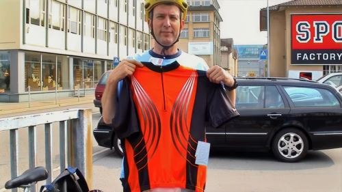 Michael, clearly chuffed with his flashy orange cycling shirt.