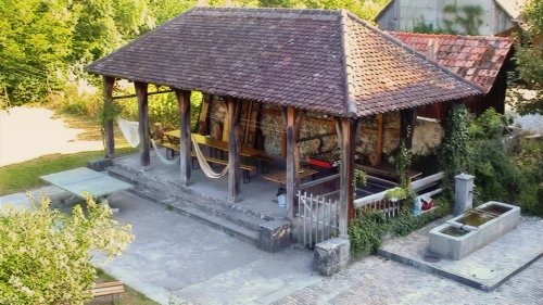 View of Brugg youth hostel courtyard, complete with stone table-tennis table.