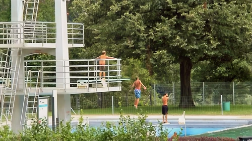 Local children jumping and diving at Aue Sports Centre, Baden, beside Route 5, 9.4 miles in.