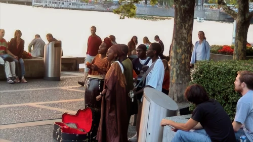 Singing group by Lake Zurich on our evening ride.