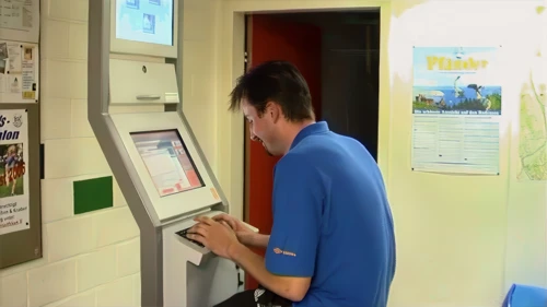 Tao at the internet terminal, Schaan Youth Hostel.