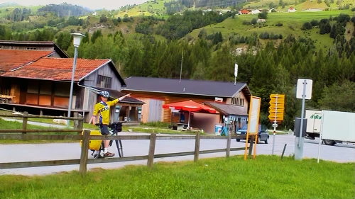 Joe points out a Romansh hillside settlement outside the guest house, Zillis.
