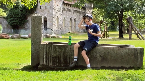 Joe ponders a cool-down at Via Gerra playground, Faido—31.5 miles in