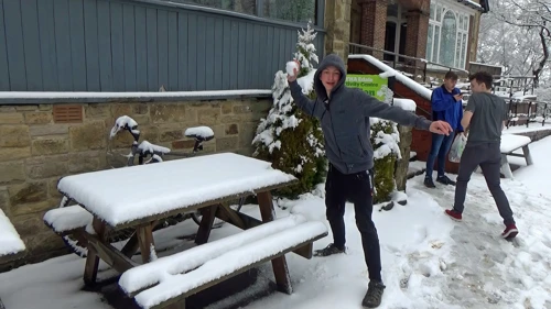Snowball fights outside Edale Youth Hostel.